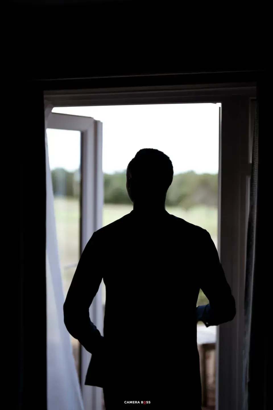 A silhouette on the wedding morning. CameraBoss portfolio: Temi and Fiyin.