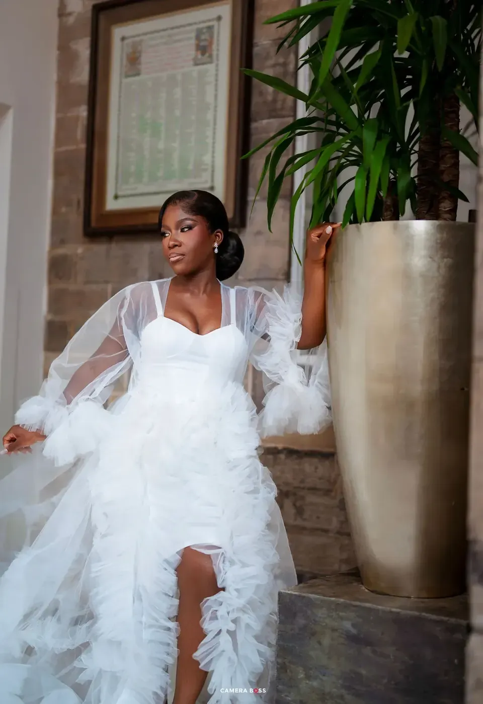 Opeyemi in her white wedding dress