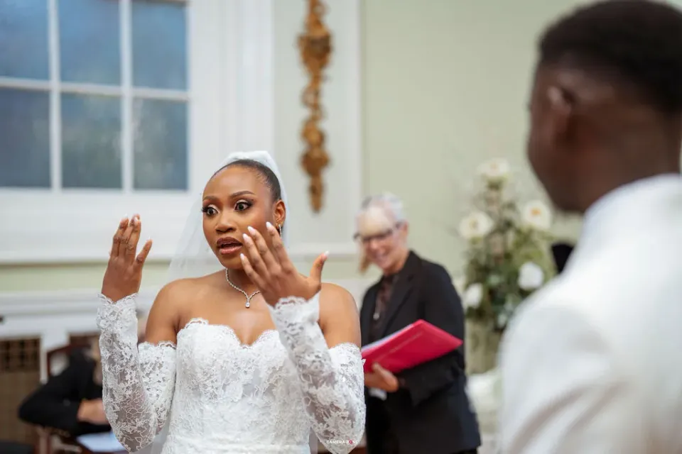 Remi reacting during the ceremony. CameraBoss portfolio: Remi and Daniel’s Bournemouth civil wedding.