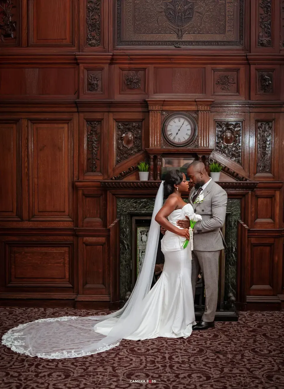 The couple embrace before their ceremony