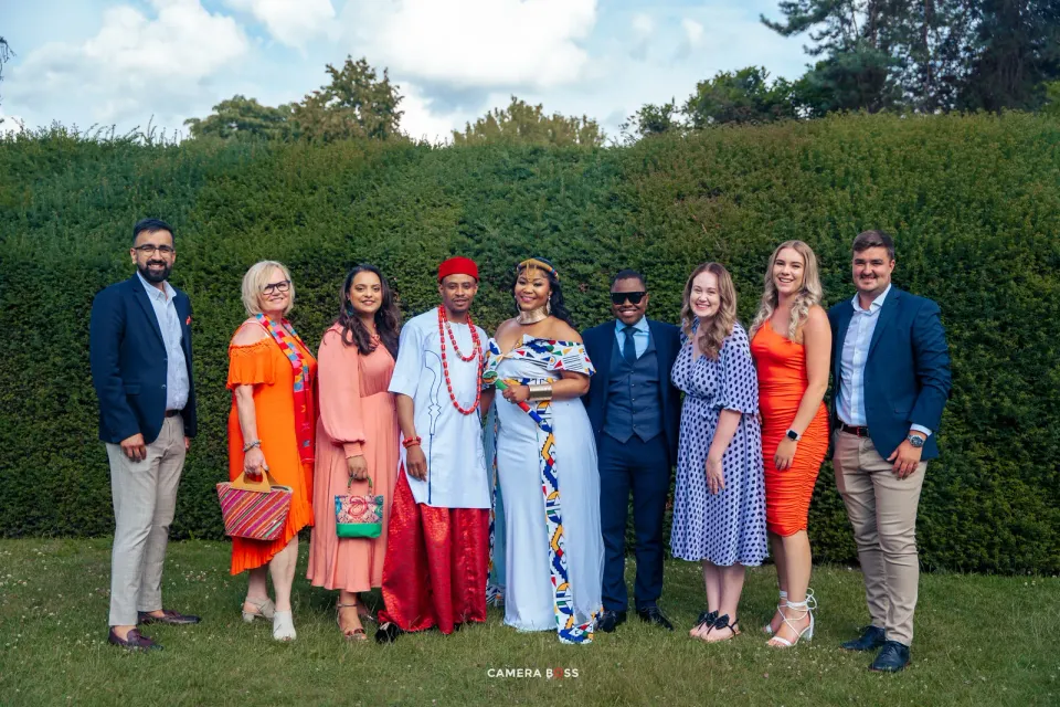 The wedding party gathered for a group portrait. CameraBoss portfolio: Vanessa Wedding.