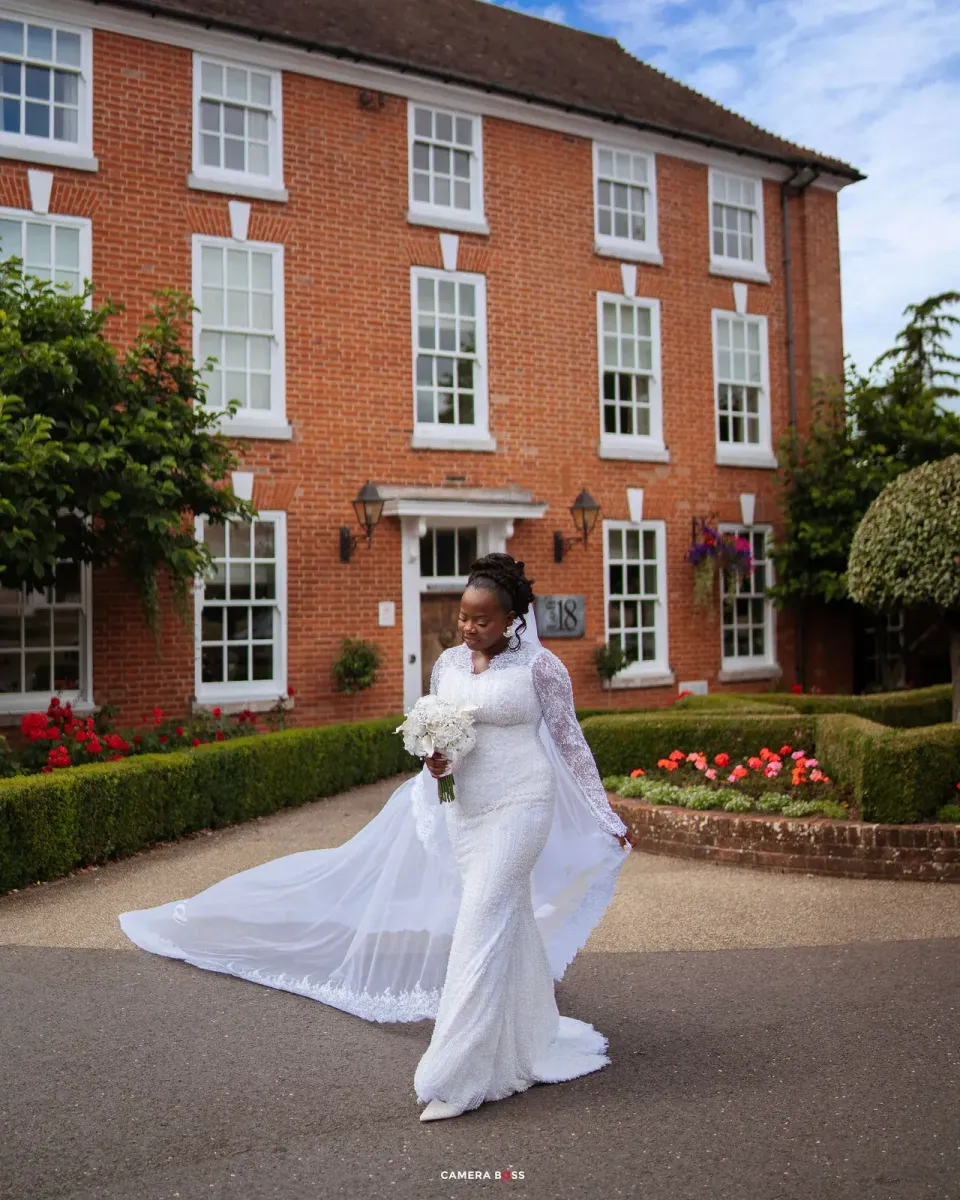 Temi outside the wedding venue. CameraBoss portfolio: Temi and Fiyin.