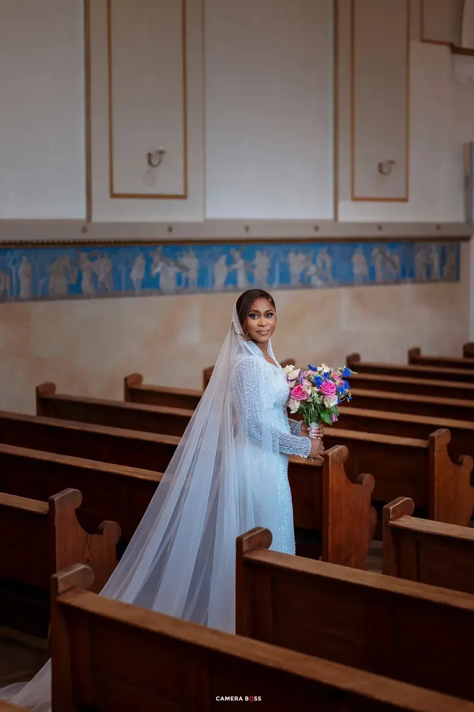 Cynthia holding her wedding bouquet