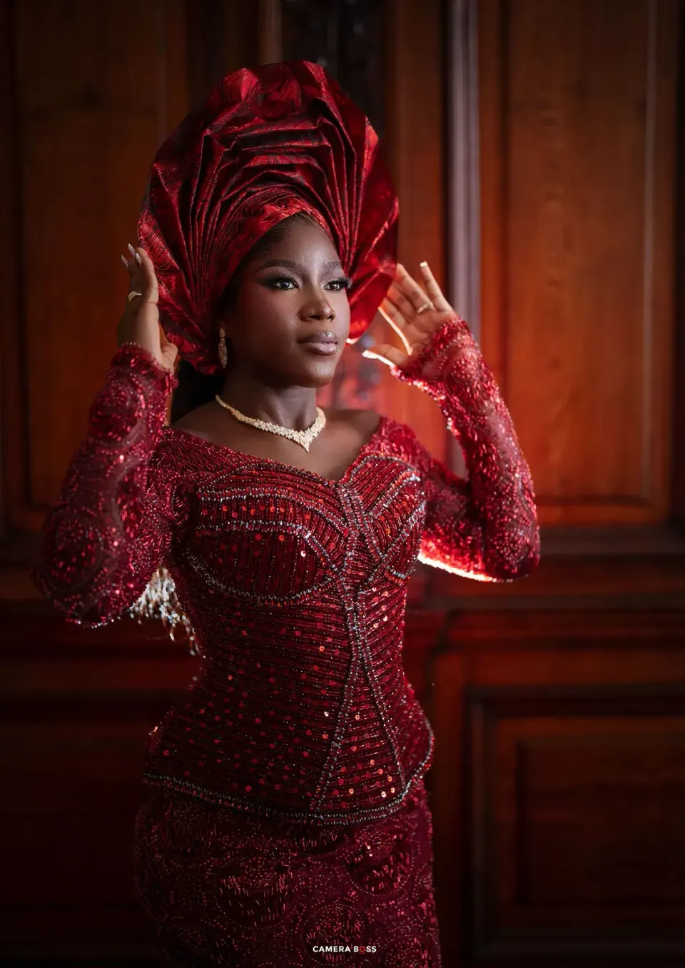 Opeyemi in red traditional wedding dress. CameraBoss portfolio: Opeyemi Wedding Portrait.