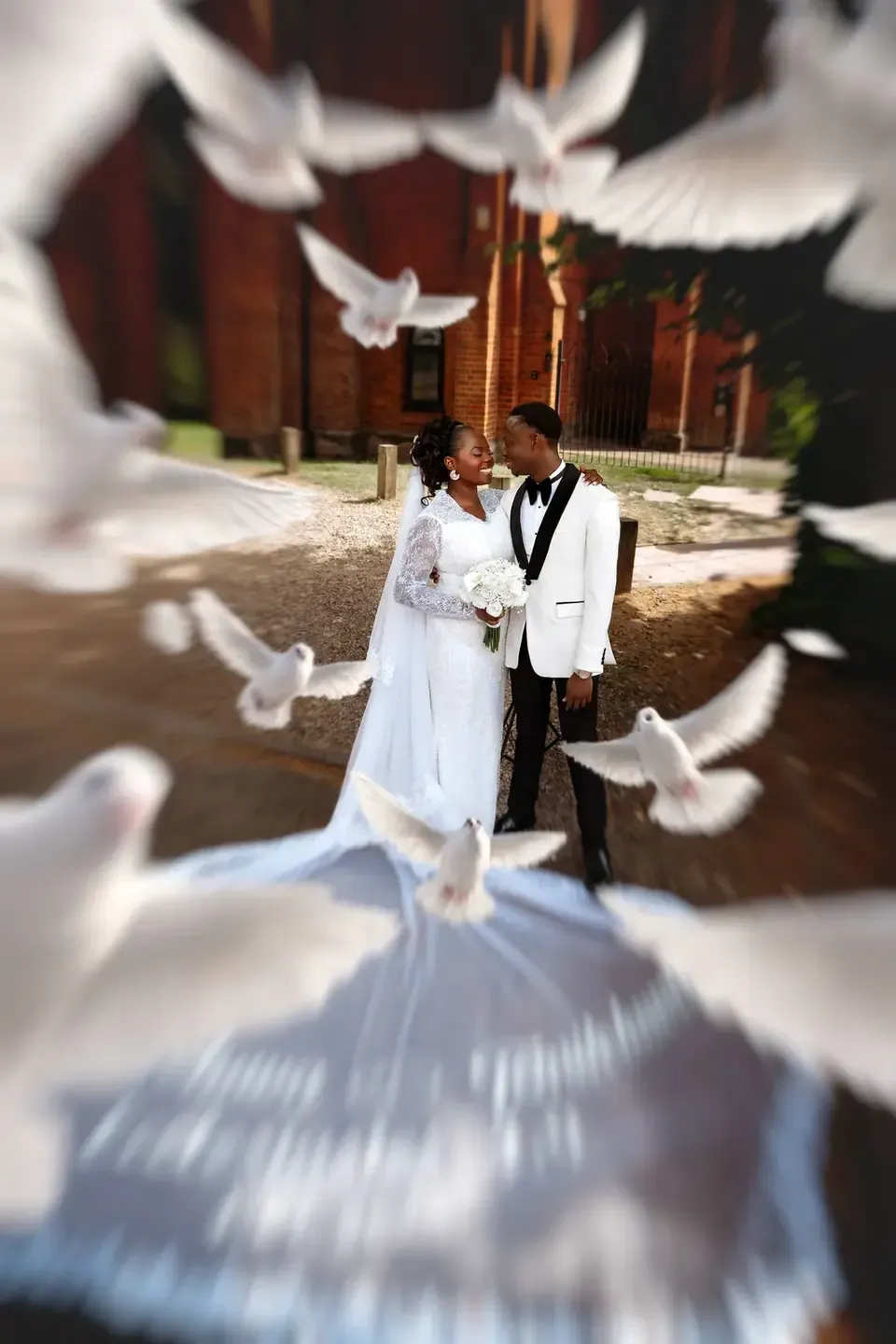 The couple with white doves