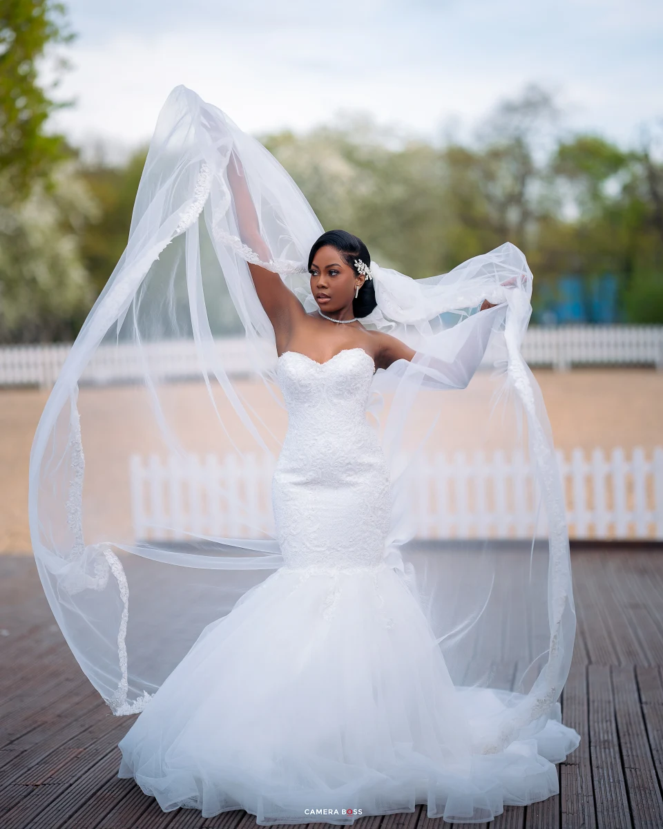 A bride lifting her veil during the CameraBoss Bridal Inspo 25 portrait shoot
