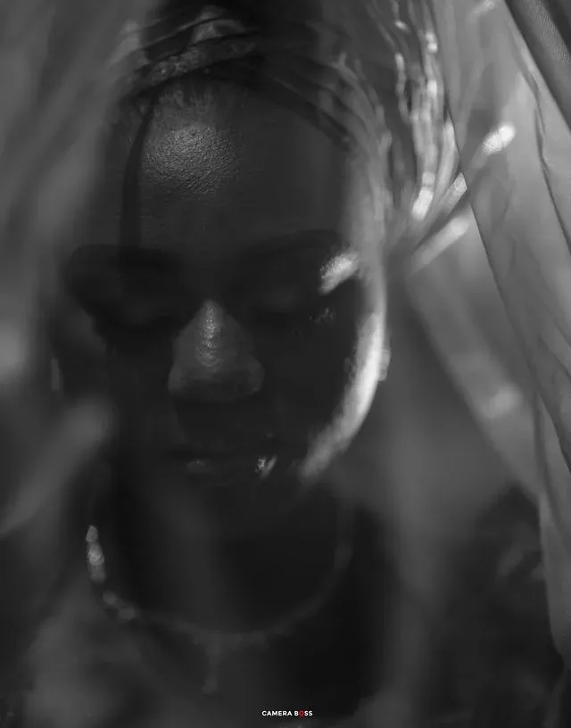 A black and white portrait through a veil. CameraBoss portfolio: Tolu Prewedding Birmingham.