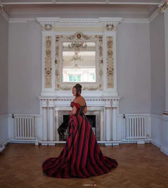 Jo standing alone in a bright ceremony room. CameraBoss portfolio: Jo and Jonny.