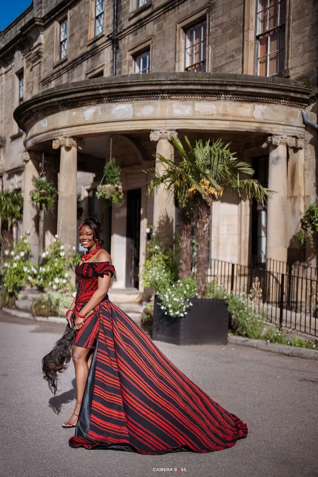Jo turning to show the shape of her red and black dress. CameraBoss portfolio: Jo and Jonny.