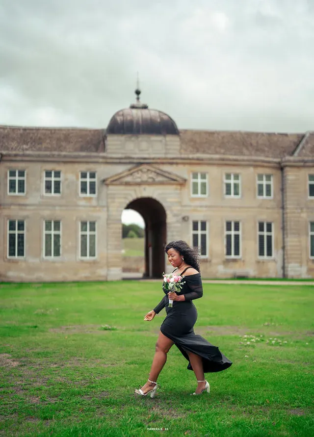 A pre-wedding portrait walking across the lawn. CameraBoss portfolio: Oney Prewedding at Boughton House.