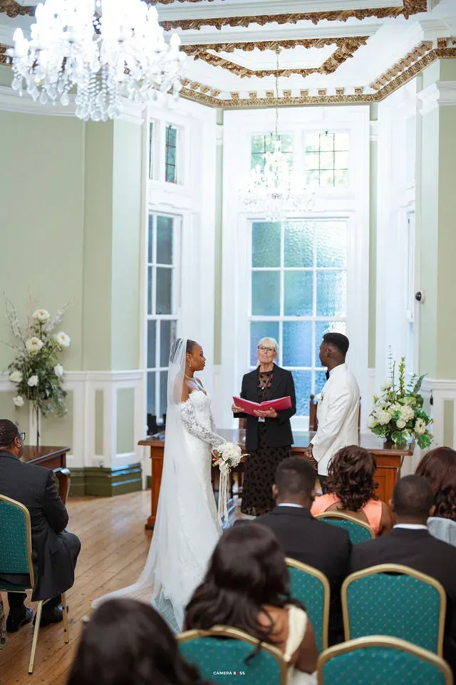 Remi and Daniel in a wide view of the ceremony room. CameraBoss portfolio: Remi and Daniel’s Bournemouth civil wedding.