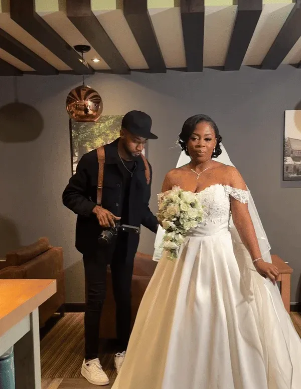 John Lekan preparing to photograph a bride on her wedding day